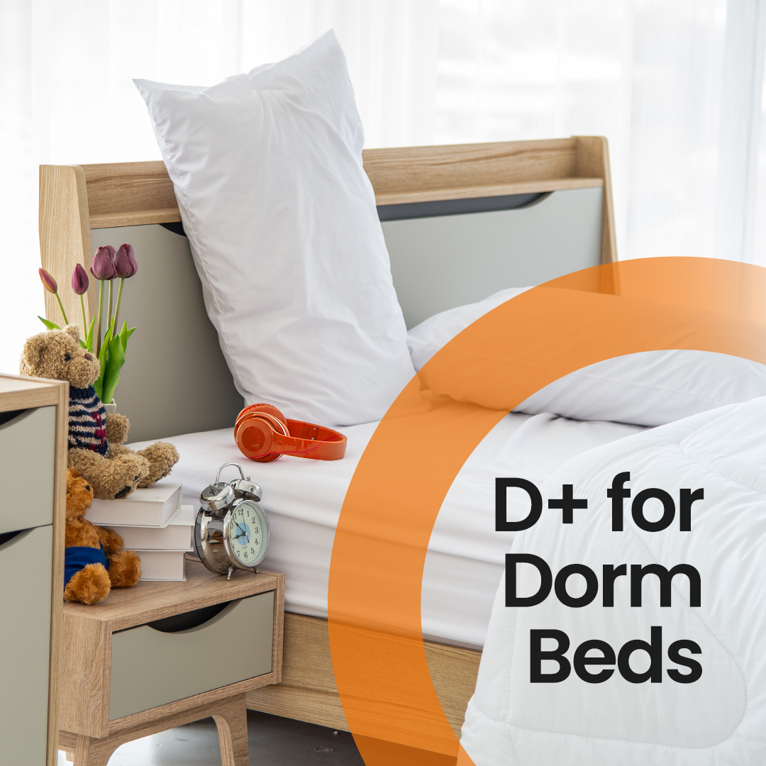 photo of a college dorm room bed with the words D plus for Dorm Beds